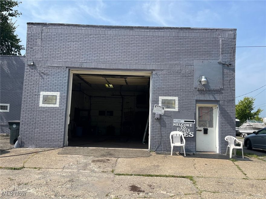Ready to start your own business? Currently this tire shop is ready to go! Walking through the front door you will walk into the office which offers a window and a paasage doorway to the shop. There is a shower/bathroom accessible. There are many overhead doors, ceilings range from 13' - 15' in height, and over 10,000 sqare feet of work space in both buildings. There are two buildings. There is lighting outisde and ample room to park vehicles. There is a chain link fence. The flar rubber roof is maintained every two years. The lift in the front does not convey.