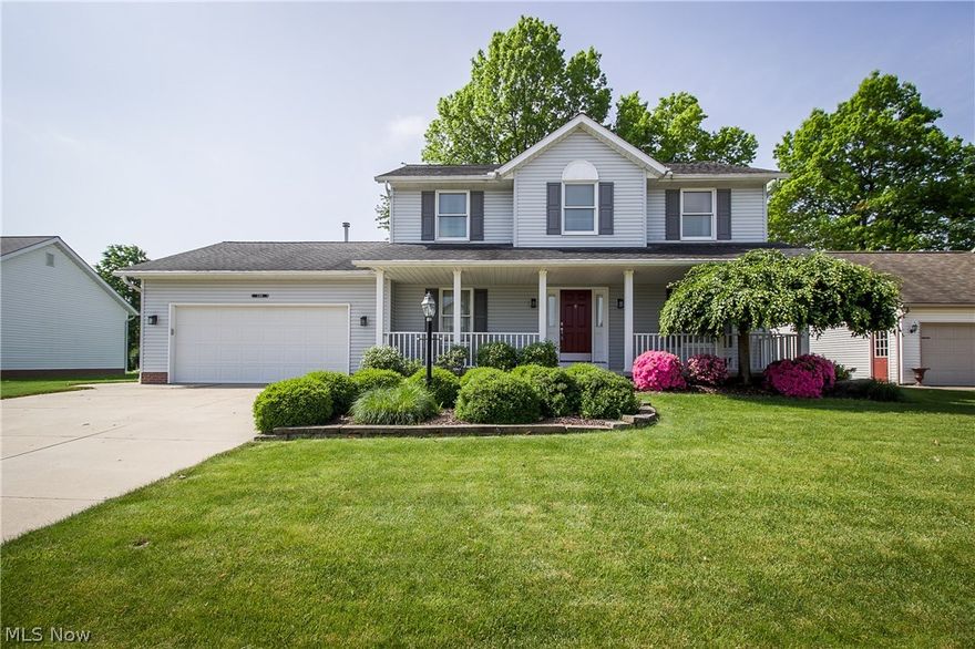 CLASSIC CENTER HALL COLONIAL IN UNIVERSITY VILLAGE!  Fantastic curb appeal and a charming porch greet you and invite you inside where you'll find a  living room and dining room with chair rail at the front of the home.  Head into the kitchen with oak cabinets, matching white appliances, and breakfast bar.  The large dinette includes a workstation and opens to the patio with views of the private backyard!  The family room features neutral carpet, ceiling fan and gas fireplace with oak mantle, perfect for those chilly days. Around the corner, you'll find a guest bathroom plus 1st floor laundry that leads to the 2 car garage.  Upstairs, the master bedroom offers a walk-in closet, storage closet and private bath with double oak vanity, garden tub, and walk-in shower.  The other bedrooms share a full bath with tub/shower combo and linen closet, plus there's another linen closet in the hall.  Tons of storage space in the 12-course unfinished basement or bring your ideas to finish for even mo