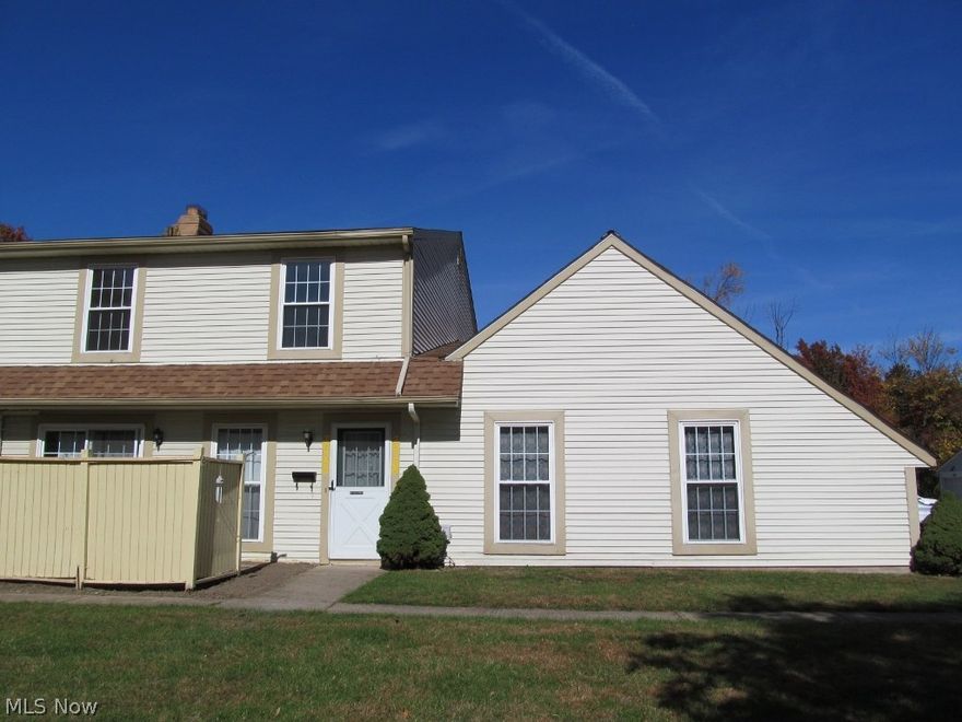 Turn the key and move in! Easy to show! Immediate possession! 2 bedroom 1.5 bath townhouse with a 1 car attached garage on a quiet low traffic street. Neutral carpeting! Updated eat in kitchen with newer appliances and oak cabinets. Slider leading to a privacy fenced patio. Vinyl replacement windows. Large owner bedroom. Extra storage in garage. Walk to the lake to lake metro park trail. Freshly painted with neutral colors 2015. Range 2012. Washer, dryer and kitchen cabinets 2010. Front door and vinyl windows 2009. Hot water tank 2008. 1 year HMS Home Warranty.