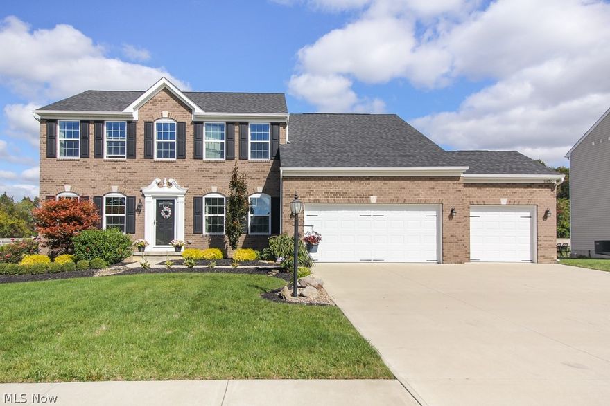 Just what you've been waiting for!  From first glance, this stately 5 bedroom colonial in desired Timber Ridge is sure to impress, with its lovely brick, attractive landscaping, and 3-car attached garage!  Why wait for new construction when this 4-year-old beauty is ready for you, and it shows like a new home!  Stylish decor throughout, and a wonderful versatile floorplan....two master suites allow for a number of options.  Step inside the front door and either side of the entry foyer is flanked by an attractive living room and formal dining room, fabulous space for entertaining!. The center hall invites you to the open concept great room, a combination of family room, spacious kitchen and sunny morning room, boasting oversized windows, high ceilings and a sliding door to the rear yard. The kitchen is a chef's dream including gleaming mocha cabinets w/an abundance of storage, stainless steel appliances, & a breakfast bar.  Feel like royalty in the grand master suite, with a large sitti