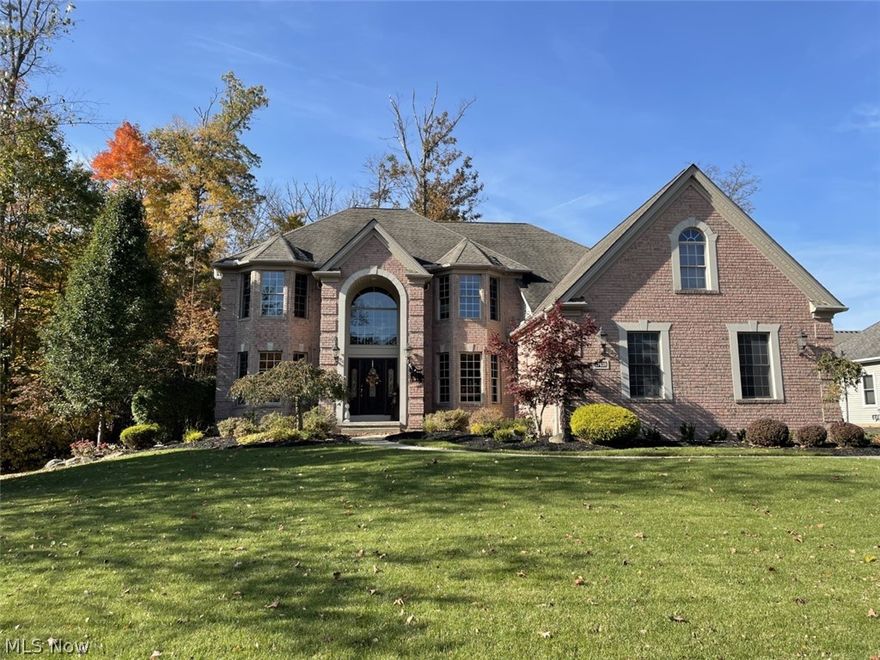 An Absolutely Beautiful Home Located on a Scenic Wooded Lot in Pinestream. This Custom Built Home By Sandvick Bldrs. is Impeccable, Featuring over 4000 Sq Ft of Quality Upgrades Starting with it's Elegant Brick and Stone Ext. Facade and Continuing Throughout. The Flr Plan Flows Like a River and Begins in a Grand 2 Story Foyer Where French Drs. lead to the Office w/Blt. in Cabinetry & New Wood Flrs. Din. Rm w/Bay Wndw, Trayed Ceiling & Wainscoting. Beautiful Wood Floors Throughout the 1st Flr. lead to the Open/Airy Sun Rm w/Panoramic Wooded Views w/Wet Bar, You Won't Want to Leave. Enter the Two Story Great Rm with Elegant Wood Encased Fireplace, Enhanced by Floor To Ceiling Windows and More Wooded Views. Updated Chef's Kitchen Featuring Lg Breakfast Bar 2020, Coffee Station, Granite Counters, Wall Oven/Microwave 2021, Soft Close Solid Cherry Cabinets, Walk in Pantry and a Bright Sun Filled Dining Area. Audio System Throughout, 1st Flr Laundry/Utility Rm and Hf Bath. The 2nd Flr offers