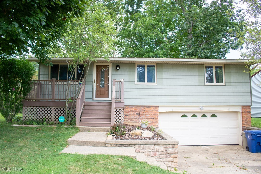 Charming 4-bed, 1.5-bath home on a scenic 0.28-acre lot along Wills Creek, conveniently located near schools. Enjoy updated flooring and fresh paint throughout the main floor, along with newer appliances, new garbage disposal, kitchen faucet, and under-cabinet lighting. The kitchen also features a walk-in pantry. Home includes baseboard heating, heat pump A/C, 200 amp service, solar security lights, and a new bathroom fan. Roof and siding were completed in 2021. Walk-out basement adds extra potential being semi finished with bedroom, laundry, 1/2 bath, living and recreational areas. Relax by the firepit or take in serene creek views from the partial wrap-around deck. Sellers leaving a few projects for new buyers to make it their own.