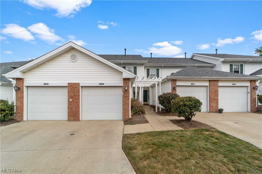 This roomy townhouse situated in the heart of Middleburg Heights offers a variety of appealing features. The spacious kitchen boasts an abundance of cabinets, stainless steel appliances, updated flooring, breakfast bar and dining area. Off of the kitchen, you’ll also find a half bathroom, laundry room, and access to the attached one-car garage. The living room is generously sized and features an elegant fireplace, with slider access to a private deck perfect for relaxing and entertaining. Upstairs are two bedrooms with plenty of closet space and a primary bedroom with vaulted ceiling. This community includes a pavilion/picnic area, lake, basketball court, baseball field, and playground for a very low HOA. All Appliances are included! Updates include: kitchen flooring (2022), bathroom vanities (2022), Roof (2021), HWT (2022).  Easy and Maintenance Free Living! Schedule your showing today.