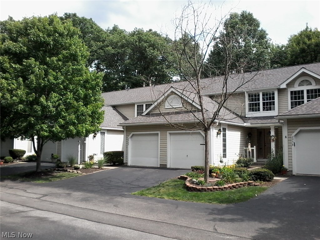 This is a well maintained Condo in prime location both geographically and in allotment. The living room has a beautiful fireplace and sliders that go out to a fenced patio area. Back yard has thick and gorgeous woods. This home has a full bath on second floor and 1/2 bath both on first floor and lower level. The lower level has a nice sized recreation room that the tenant is using for a music studio. The attached garage has room to store plus a full down ladder for access to attic storage.