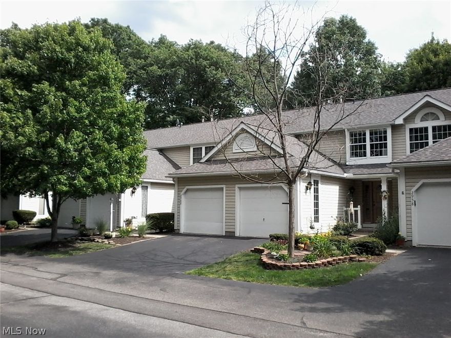 This is a well maintained Condo in prime location both geographically and in allotment.  The living room has a beautiful fireplace and sliders that go out to a fenced patio area.  Back yard has thick and gorgeous woods.  This home has a full bath on second floor and 1/2 bath both on first floor and lower level.  The lower level has a nice sized recreation room that the tenant is using for a music studio.  The attached garage has room to store plus a full down ladder for access to attic storage.