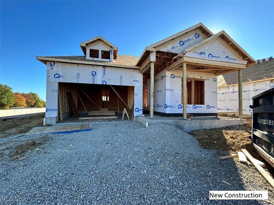 Welcome to Homesite 17 in Heritage Park, where timeless design meets an unbeatable location. It will be move-in ready by mid-February, allowing you to start the new year in your dream home. This stunning ranch home sits on a peaceful cul-de-sac and backs to a wide-open field with a tranquil pond view and no homes built directly behind you. The neighbors beyond are set far back, creating a rare sense of privacy and serenity. The exterior is beautifully appointed with stone accents and a welcoming front porch, both of which are homeowner favorites. Inside, the home showcases our Classic styling — elegant, refined, and designed to stand the test of time. Soaring ceilings enhance the sense of space and luxury throughout, with a minimum ceiling height of 10 feet, a dramatic 13-foot tray ceiling in the foyer, and a vaulted ceiling in the great room that creates an open, airy feel. The kitchen is a showpiece with white shaker cabinetry, luxurious steel gray leathered granite countertops, and top-of-the-line GE Café appliances, including a 36-inch gas stove and a rarely included refrigerator. Feature walls in the foyer and owner’s suite add architectural character and warmth. A huge unfinished basement with rough-in plumbing for a future full bathroom provides endless possibilities for additional living space. Heritage Park offers a peaceful, low-maintenance lifestyle close to everything you need. Lawn care and snow removal over two inches in your driveway are included, and strong warranties let you leave your worries at your old home. This is the lifestyle you have been searching for — more time for what matters most, and less time spent on home upkeep.