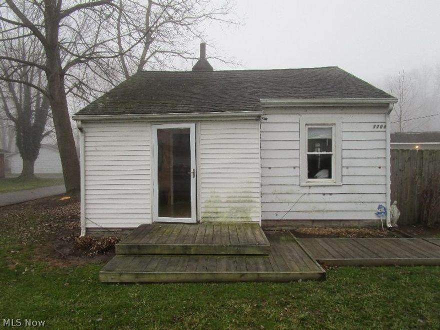 Possibilities abound!!  Darling 2 Bdrm, 1 Bath Sided Ranch Style Home with 2 Car Detached Garage, Living Room with Gas Fireplace, Large Eat in Kitchen, 1st Floor Laundry, 2 Good Sized Bdrms, Patio, Fenced Rear Yard, Double Lot and More!  Mechanics are newer-newer Garage Roof, Electric, Furnace, Hot Water Tank and Plumbing.