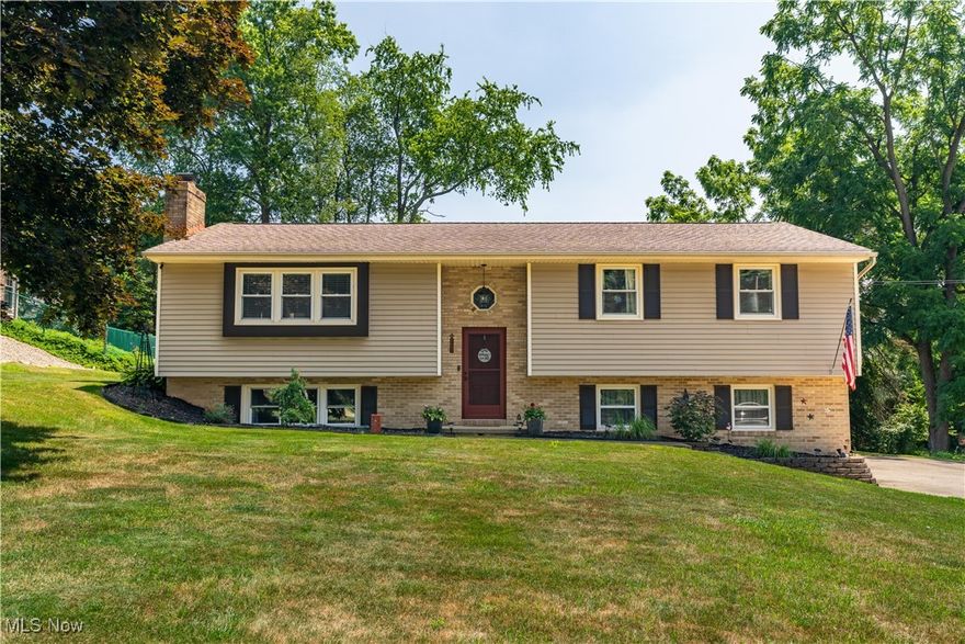 Welcome home to this beautifully updated 4 bedroom, 3 full bath split level in Jackson Local Schools ! A Perfect blend of comfort, style, and function.  Step inside to a bright, open layout featuring modern finishes throughout-including sleek granite countertops, stylish light fixtures and COREtec flooring. The large living room is flooded with natural light and flows effortlessly into The heart of the home-the spacious kitchen. With gorgeous granite countertops,  induction cooktop and convection oven, and all newer appliances, it is the perfect place for your next gathering.   Make your way down the hall to the Master bedroom and bath, 2 additional generously sized bedrooms and one more full bath. Downstairs, a large rec room offers the ideal space for a cozy second living area and great movie nights. There is also the 4th bedroom and full bathroom! Step outside to your backyard retreat complete with new patio, fire pit,  and a fantastic covered deck-ideal for year round enjoyment and gathering with friends and family.