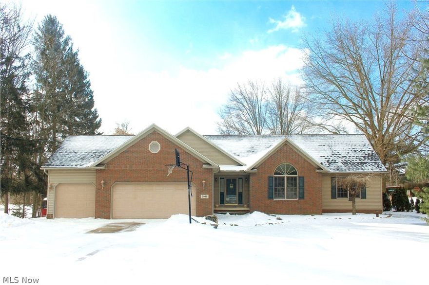 Wow! Gorgeous 4-5 bedroom Ranch on a .6 acre lot! Open floor plan with vaulted ceilings and high end upgrades throughout. Spacious great room with a stone fireplace and a wall of windows overlooking the pool and private lot. Vaulted ceilings continue into the rich cherry kitchen with stainless appliances, hardwood floors and a big, bright dining area. The master suite has a private bath with double sinks, jacuzzi and walk in closet. Three additional rooms complete the first floor, one with french doors which could be an office or used as bedroom #4. The fabulous lower level has been professionally finished with an extra large rec room including a second fireplace, home theater, half bath and additional bedroom. Three car garage, first floor laundry and so much more!! Schedule your showing today!