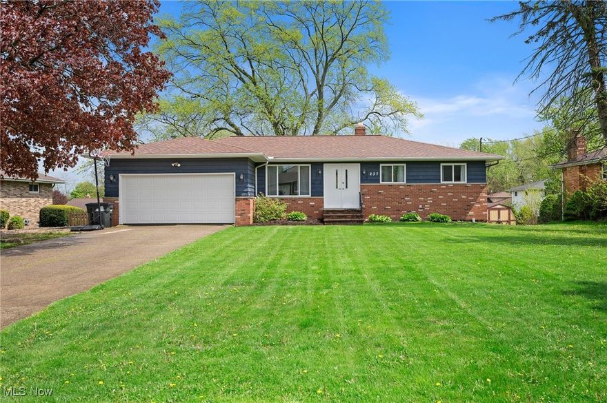 Welcome to 237 Judita Drive—an inviting ranch style retreat tucked into one of Brunswick’s most convenient neighborhoods, just moments from Mapleside Farms, shopping, dining, and I 71. Step inside to a sun splashed living room where wide plank flooring (2018) sets a warm, contemporary tone and flows seamlessly into the kitchen. Here, freshly painted solid wood cabinetry provides abundant storage; a dedicated coffee bar alcove makes morning routines a delight; and the built in oven, cooktop, and included refrigerator let you move right in and start cooking. A step down, the spacious family room features a painted wood burning fireplace—perfect for cozy evenings—and opens to a light strung patio plumbed for the gas grill that stays with the home, all overlooking a fully fenced backyard installed in 2019.
The private primary suite is a true sanctuary, offering an oversized bedroom, dual closets, and a bathroom with dual sinks and a soaking tub. Down the hall, two additional bedrooms enjoy newer flooring (2018) and easy access to a second full bath. Need extra space? The expansive finished basement—with freshly painted floors, laundry area, half bath—delivers all the room you need for game nights, workouts, or a home office. House also features a whole house fan added in 2021. Outside, the exterior was painted a stylish deep blue in 2019 complemented by new gutters and LeafGuard protection for low maintenance peace of mind. Thoughtful updates, a versatile floor plan, and a prime location make this home a standout value—schedule your tour today and see why 237 Judita Drive should be your next address!