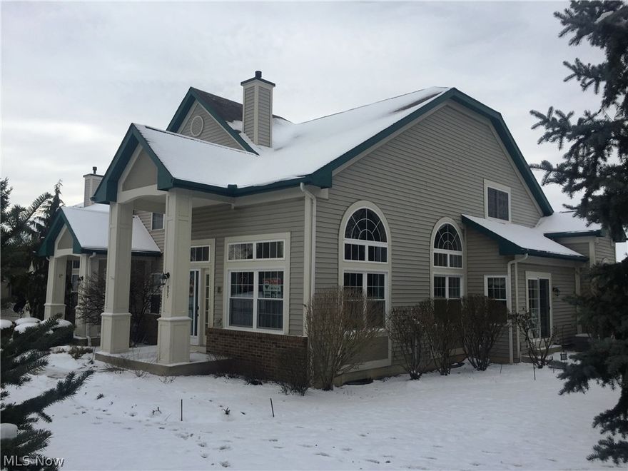 Shows like a model. Must see this beautiful end unit with tons of natural light, soaring ceilings, hardwood floors, large eat-in kitchen, 2 spacious bedrooms, 1 up and 1 down + oversized loft overlooking great room with cozy fireplace! New windows with lifetime warranty. Newer hardwood floors, and  hot water tank. Very well maintained. Finished lower level.