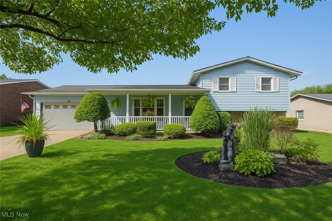 Enjoy resort-style living in this beautifully updated Perry split level with an inground pool! At the heart of the home is the remodeled kitchen, soft-close cabinetry, an island, pantry, and pocket door access to the laundry. Hardwood flooring carries through the dining area into the front living room, where a large picture window fills the space with natural light.
The lower level family room offers a cozy retreat with a wood-burning fireplace surrounded by a full stone wall and easy access to a full bath with a corner shower. Upstairs, you’ll find all three bedrooms along with a stunning full bath featuring detailed tile work and a tub/shower combo.
Step outside to the perfect gathering spot for family and friends on the cabana-style covered patio, designed with a ceiling fan, TV, and bar with a mini fridge. From there, enjoy a view of the 16x32 inground pool, complete with a Hayward cleaner and safety cover.
Manicured landscaping, an inviting front porch, an attached two-car garage plus within walking distance to all the fun of Sippo Lake and Park make this home even more appealing! Call today to schedule your showing!