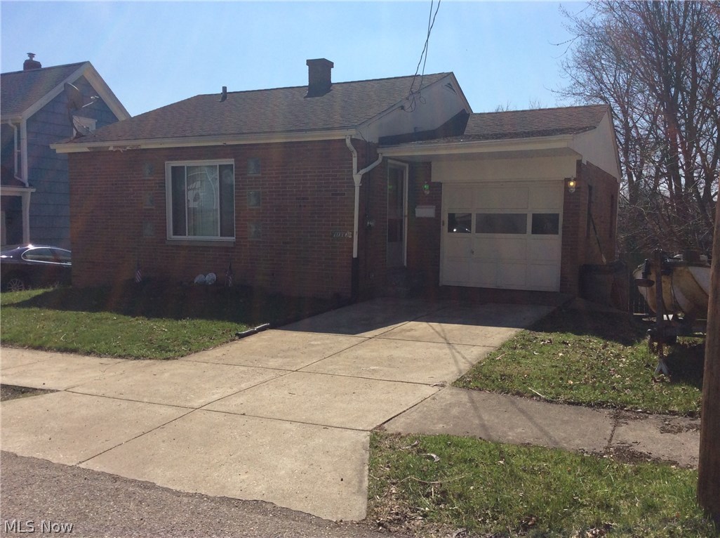 Bi-Level all brick home with hardwood floors on upper level. 12' x 24' utility + laundry area and shower /bath area on lower level. Kitchen opens inot the back yard. Single car attached garage with opener. Walk out basement. Call today