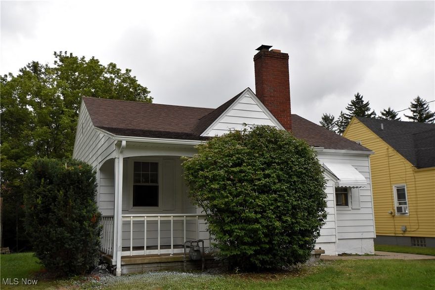West Side home close to schools and the public library. This home features a large eat in kitchen, hardwood floors, and a full, open basement . The roof is newer.