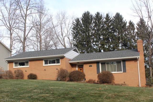 Wonderful home & value for this all brick 3 bedroom , 2 bath split level* Situated on picturesque corner lot with circle driveway, approx. 1382SF and numerous updates* Living room with gas log or wood burning fireplace* Partially finished recreation room (23x13) with wood burning fireplace* Living room, dining room, steps & hall carpet 3 months old* Hardwood floors under carpet in most rooms* Formal dining with built in cabinets* Eat in kitchen with ceramic back splash & floor with access to back yard* Oversized 2 car heated garage (approx. 22x26)* Hot water heater & softener (approx. 2000)* Anderson windows (4/2005)* 30 yr. shingles, single layer (2004)* Brick patio* Storage shed* Home warranty provided* Immediate possession*