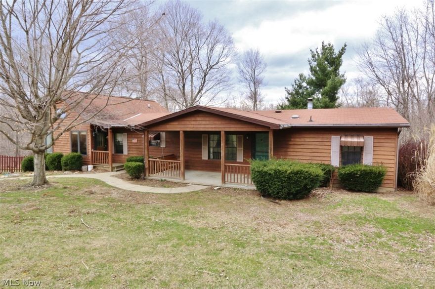 This is a real find! Cedar ranch home on over 7.5 acres on a paved road. Ranch home has Living room, Eat in Kitchen with 5 burner stove and dishwasher. Master bedroom has private bath. Other full bath serves other two bedrooms. There is a half bath off the living area. Full basement has two exits to outside. There is a gas heater in the basement in addition to the central heating and air conditioning. The living room fireplace is propane and has a blower. The other fireplace in the family room is natural gas. The detached garage is set up for cars or chickens or both. The garage door opener is in a box on the floor and will stay with the property. There is a nice garden space that is all ready for your plants. Present owner raised chickens. Huge basement could be used for many things.The half bath down has a commode at present but roughed in plumbing for sink or shower. Lovely covered deck off living room.