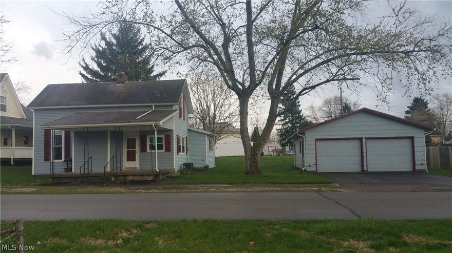 TRI VALLEY SCHOOL DISTRICT!  2 parcels - huge detached 2 car garage - newer siding - windows - painting and carpet - Located just a few miles from Dresden - centrally located between Zanesville, Coshocton, and Newark - 3 bedrooms (a den on main floor could be changed to include another 4th bedroom adding a closet or a very nice office space) Newly decorated kitchen cabinets - huge master bedroom on the main floor - plenty of space for a large kitchen table in the dining room - curved stair case leading to 2 additional bedrooms with an access to a special nook going up the stairs for playhouse - nice flat lots -