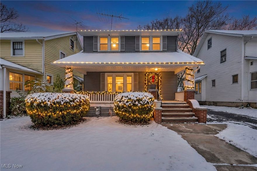 Charming and move in ready! Welcome home to this spacious, light-filled, and beautifully updated colonial situated on a quiet, desirable street of well-cared-for homes. Enjoy relaxing mornings or peaceful evenings on the charming front porch, or take advantage of the convenient garage and partially fenced yard for added functionality. The exterior features a freshly refinished and repainted steel siding for durability and curb appeal. Inside, you’ll find a updated warm, inviting interior highlighted by premium hardwood floors and newer vinyl windows for year-round comfort and energy savings. The heart of the home is the stunning 2023 custom white shaker-style kitchen, thoughtfully reimagined with 42” soft-close cabinets, added counters for extra workspace, and premium stainless appliances—including a dishwasher. Upstairs, enjoy three generous bedrooms, each with ceiling fans and rich hardwood flooring, plus an oversized full bath and a private 2nd-floor balcony for added charm. The full open basement offers endless possibilities for storage or future expansion. Recent updates also include a new hot water tank (2023) and numerous modern touches throughout. A truly beautiful home inside and out—easy to show and available for immediate occupancy!