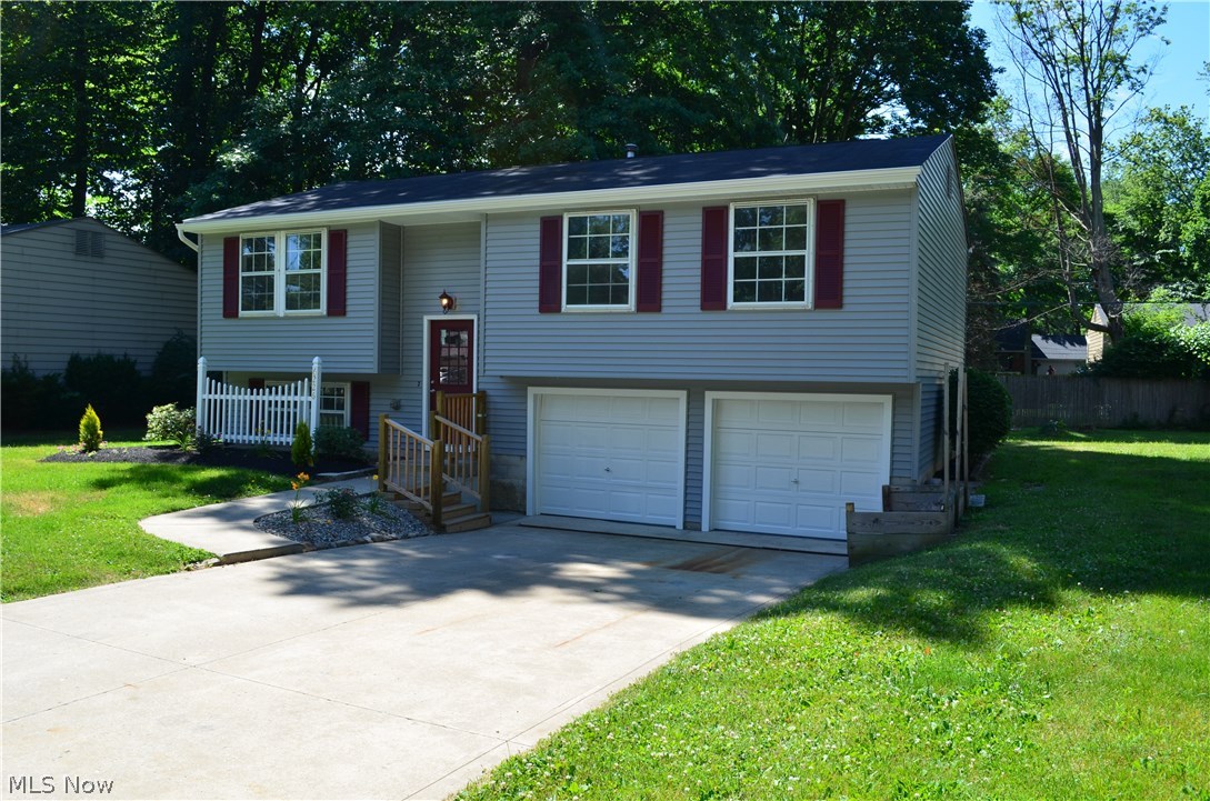 This stunning bi-level in the heart of Madison is all ready for your furnishings!! The home features 3 spacious bedrooms, newer Kitchen cabinets, newer trim package and doors. No need worry about a thing with all the major items have been replaced as well, such as siding,Hvac and hot water heater. The full and half bath has been updated as well. Newer flooring throughout the whole home. The two car attached garage has newer garage doors, Great location with a shaded back yard for the kids to play and a shed to store lawn equipment. Call the list agent today to schedule your private showing!!