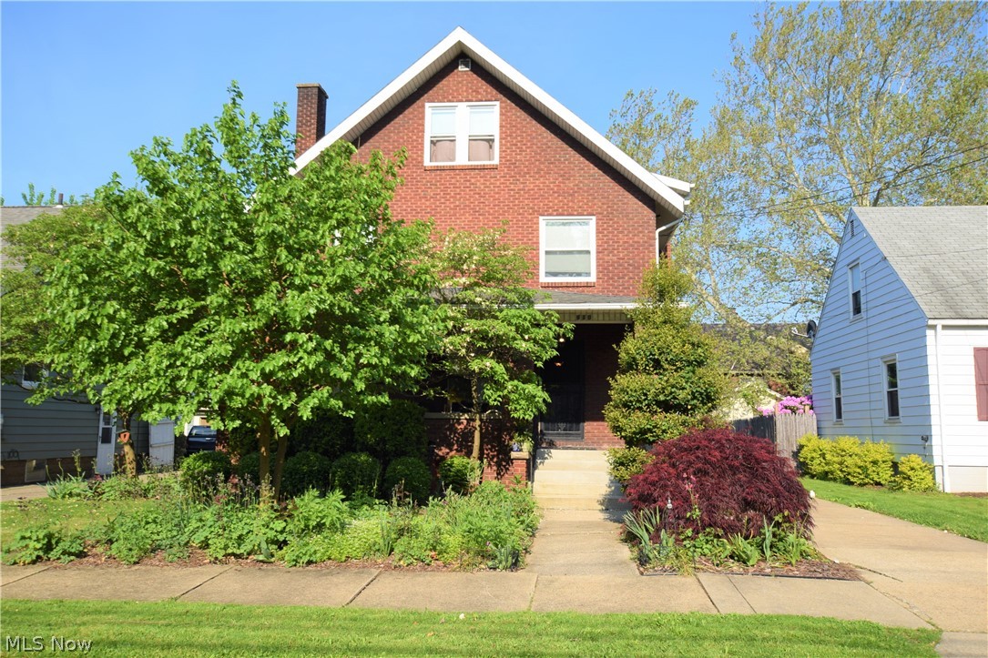 Welcome to 910 Woodward Avenue in Akron! This enchanting 5-bedroom, 2-bathroom home with three levels has a ton of character. Much of the home still has original wood floors and woodwork. The bright kitchen has newer clean tiling and pretty cabinets. Off the kitchen is a full bathroom with a laundry hook-up. The spacious dining and living rooms provide areas to entertain. The living room has a beautiful brick fireplace. Head upstairs to the next level to find 3 of the bedrooms and a large newly renovated bathroom. On the third floor, you’ll find two more bedrooms and a storage room. The property has a detached two-car garage and partially fenced in backyard. The large covered front porch offers a cozy place to relax outside. The pretty trees in the front yard provide a bit of privacy while you’re sitting on the porch. Schedule a showing for this beautiful home today!