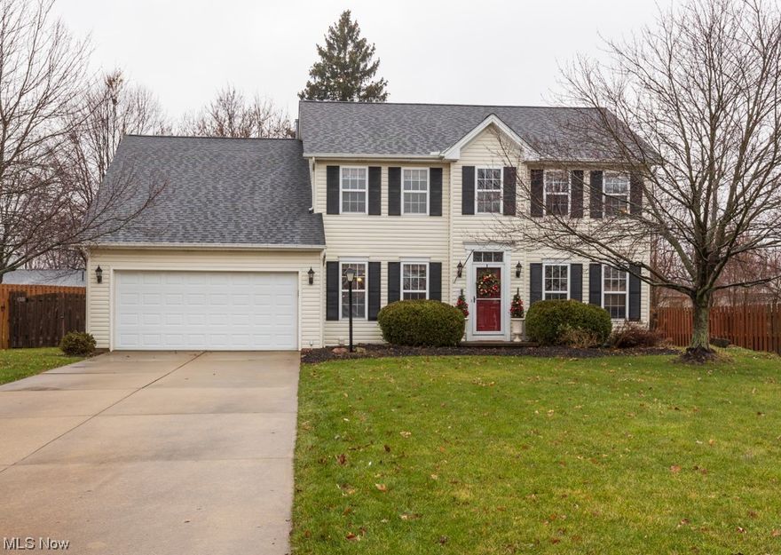 Looking for a spacious colonial in a great neighborhood on a quiet cul-de-sac, with plenty of room for the whole family AND a fenced-in backyard for the 4-legged members? Then look no further: This one’s for you! Inside, there's a study (currently used for homeschooling), a formal dining room with trey ceiling, and a family room with a gas fireplace, stone hearth and wooden mantle with windows that face the backyard. The huge eat-in kitchen has sliders to the patio, SS appliances, including a new “smart” stove, dishwasher and garbage disposal. Just off the kitchen is a half bath and first floor laundry! Going up, you’ll find 4 bedrooms and two full baths. The master bedroom is very spacious and has a large, walk-in closet. The ensuite has a walk-in shower, soaker tub, granite counter top, new toilet, new window and LVT flooring. All the bedrooms have large closets and the main full bath was updated approx. 5 yrs ago. In the recreation room, hang out and relax around the built-in bar area, or watch the game with friends on the wall-mounted TV. Even the fridge stays! A new full bath was recently added, along with TONS of built-in storage for your convenience. Outside, you can grill on the concrete patio as you gather with friends and family around the table or sit around a fire under the stars. The garage has a new “smart” opener which can be operated remotely by phone! A one-year home warranty is being offered for your peace of mind, so don’t wait, schedule your showing TODAY!