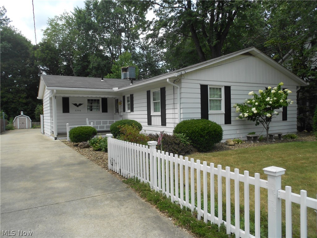 Location, Location, Location! Desirable ranch has a contemporary feel in the heart of Stow. This 3 bedroom, 2 full bath home features a two sided gas fireplace to enjoy from both the living room and the eat-in kitchen. White cabinetry and plenty of counter space can be found in the eat in kitchen (all appliances stay). Both the living room and master bedroom are accented with crown molding. All three bedrooms have nice closet space and the main bath offers a linen closet and large vanity with double sinks. The finished basement is an added benefit with rec room with surround sound, full bath, bonus room, laundry and workshop. A shed, 12 X 12 deck with built-in bench and partially fenced in backyard. Newer windows (2013) and newer garage door (2014) are just a few of the updates in this well maintained home. The TV and stereo equipment in the recreation room will stay with the surround sound (no value added). Close to Holy Family, restaurants, and shopping.
