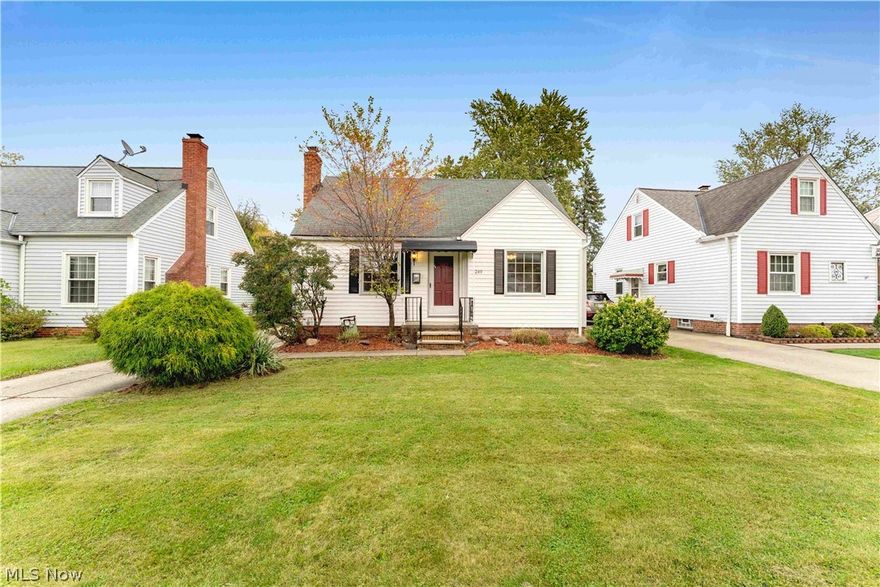 This gorgeously renovated bungalow home in Willowick is the perfect find for first time buyers! Lovely details throughout, like the rear kitchen extension with vaulted ceiling and skylights will have you falling in love at first sight! The charming exterior is warm and welcoming with professional landscaping and draws you right inside! Once inside, you'll find a bright living room with beautiful hardwood floors and cozy fireplace! Continue to the rear of the home to the spacious open plan kitchen with large dining area, wrap-around cabinets, kitchen peninsula with bar seating, tons of natural light and French doors opening on to the private rear patio! The main floor also has 2 good sized bedrooms and the main full bathroom. Upstairs you'll find the master suite, with another skylight, built-in storage and an ensuite full bath as well! The home also has a partially finished basement with space for a rec room, separate laundry area and built-in work bench! The home has a detached 2-car