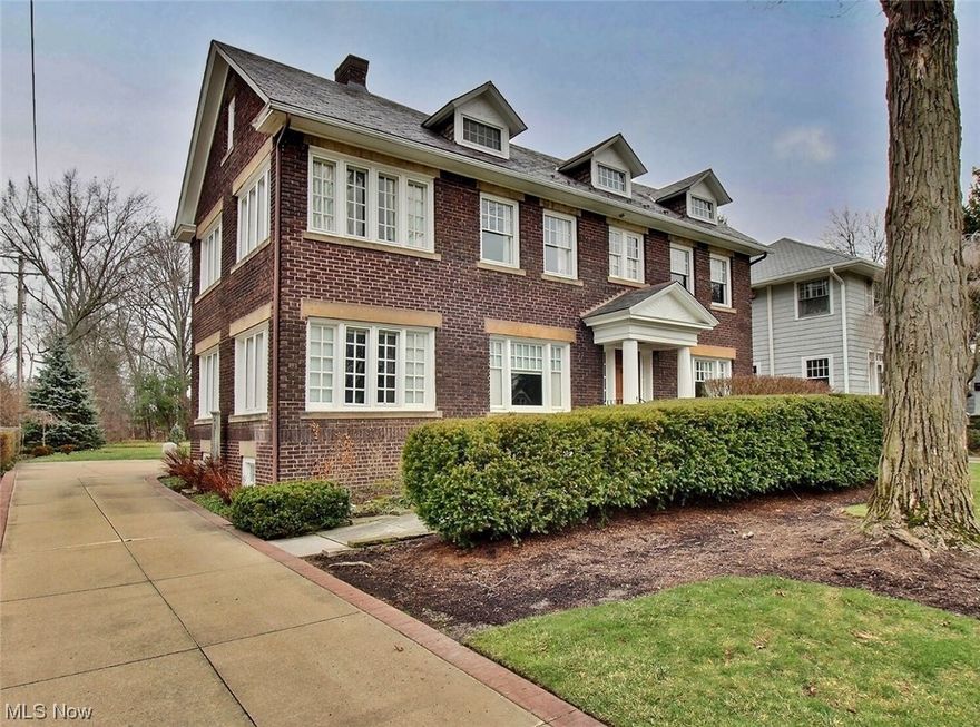 Beautifully updated brick Georgian home with timeless charm! The heart of the residence is the inviting kitchen, featuring a spacious center island, cherry wood cabinets, top-of-the-line appliances, and access to the back patio. Elegant living and dining spaces, a sunlit room with walls of windows, a half bath, and refinished hardwood floors define the main level. Upstairs boasts a bonus room, an office with built-ins, three bedrooms, two and a half baths, and a versatile third-floor rec room or teen suite. The well-landscaped yard includes a patio, providing a perfect outdoor retreat. Situated in the coveted Fairfax Triangle neighborhood, this home is conveniently located near Shaker Lake, parks, a nature center, shopping, dining, museums, and world-class hospitals. Enjoy the perfect blend of modern amenities and classic sophistication in this exceptional residence!