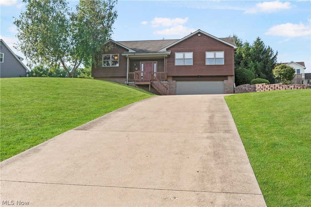 One-owner custom-built home in beautiful Bolivar! This fantastic bi-level home is situated on a .60-acre lot just minutes from the highway and downtown area. Enter this charming home to an open concept main floor, with a lovely foyer that leads to the great room with a vaulted ceiling, recessed lighting, and sliding doors to the private backyard. Enjoy the beautiful views from the formal dining room with chair rails and crown molding. The eat-in kitchen is centrally located and offers appliances, plenty of cabinets & countertop space, a vaulted ceiling, and a dinette area open to the great room. The master bedroom has a large walk-in closet and a master bath with a walk-in shower and large vanity. Two bedrooms w sizable closets and a full bath complete the main floor. The lower level features a spacious recreation room with glass block windows & recessed lighting, a laundry room (plumbing for a full bath), a storage area, and access to the two-car garage—an extra large concrete drivewa