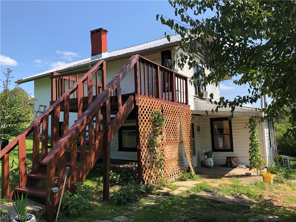 This one is 4-H ready. This house sits on just under 2 acres and includes a newer pole barn built around 2015 (approximatley 576 square feet). There is also a shed (approximately 2017) that will stay with the house. The main level features 3 bedrooms and an enclosed front porch area for plenty of extra storage. Just off of this area is a nice deck. The lower level includes a laundry room area, full bath, eat in kitchen and living room. Metal roof installed on main house in approximately 2017. Hot water tank is about 2 years old. 200 amp breaker box. Kitchen stove and refrigerator will stay as well as the washer and dryer. Plenty of off street parking. Public water and septic. New mini split system in the kitchen was just installed about 2 years ago. Mineral rights were leased with Eclipse but have since expired; they will transfer with the property; current owner has rights to half of the those.