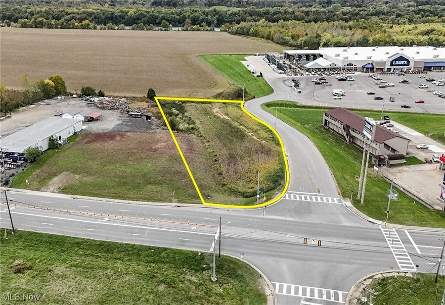 1.25 acres vacant land in high visibility, high traffic area of Marietta, Ohio. Located on corner of SR 7 (about 40' frontage) and Lowe's Home Improvement Road (390 ft frontage with 2 curb cuts), streetlight at the intersection, hotels, restaurants and other businesses in the area recently built, which includes Texas Roadhouse and Wash-Rite Carwash. The adjoining River's Edge Shopping Center, located on banks of the Ohio River, boasts anchor retail strength unmatched in the market area. Not only does it include a Walmart Supercenter but is also home to Lowe's and 43,594 sf of premier national retail and restaurants serving this strong market. Additional .91 acres available if needed, see MLS #5080742.
