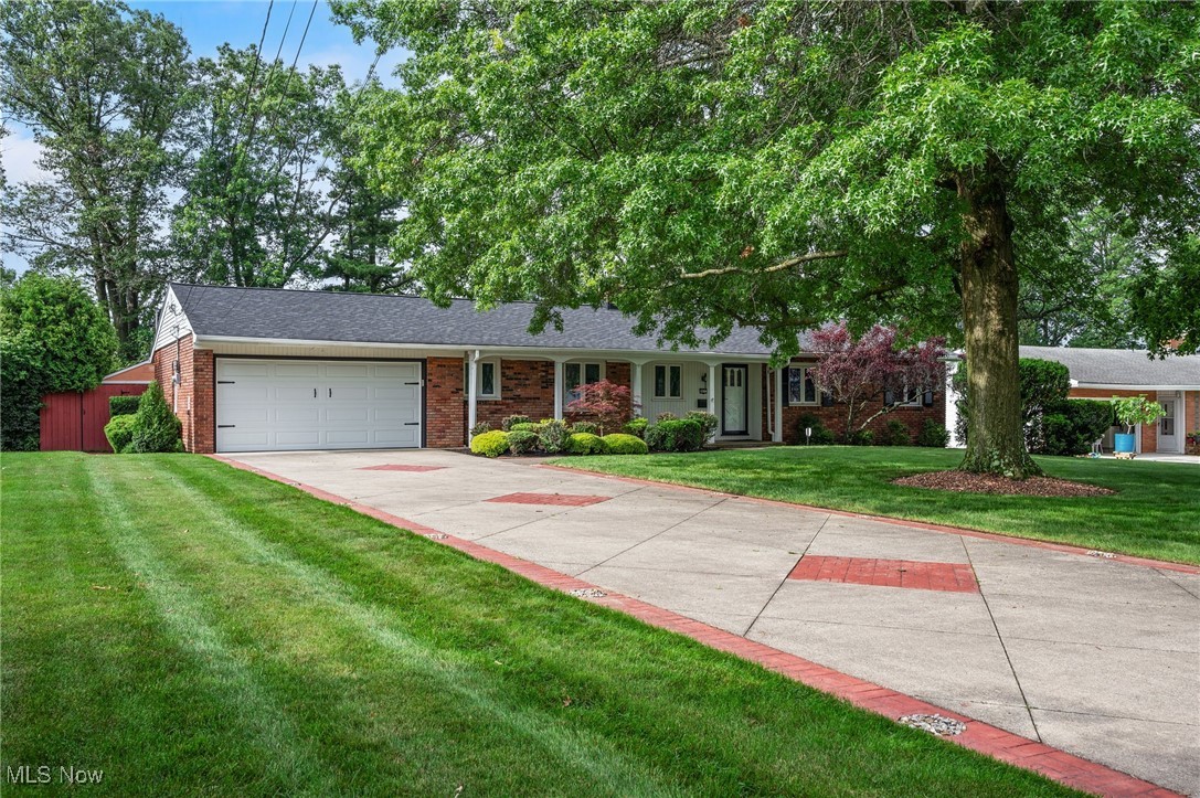 This recently renovated ranch offers true first-floor living on nearly half an acre, featuring a large fenced-in yard, a partially finished basement, and an ideal layout for everyday comfort and convenience. Set on a beautiful 0.4-acre lot, this home blends indoor and outdoor living with thoughtful updates throughout and plenty of space to spread out. The main living room centers around a cozy fireplace and flows seamlessly into the dining area, where sliding doors open to a tree-lined backyard. Just beyond, enjoy a meticulously maintained inground pool, complete with a deck for entertaining and a shed for extra storage. A second living space showcases a charming beamed ceiling and also overlooks the backyard with its own access point. All three bedrooms are located on the first floor, including a primary suite with a private full bath, while a second full bath is shared by the remaining bedrooms. The kitchen and laundry room round out the first-floor layout, and the partially finished basement offers excellent flex space—perfect for a game room, home gym, or office—along with ample unfinished storage. An attached, heated two-car garage includes a third bathroom, ideal for pool days or hosting guests without tracking through the house, plus direct access to the backyard! Located just minutes from major highways, local shops and restaurants, and the beautiful Metroparks, this home checks all the boxes for both everyday living and entertaining.