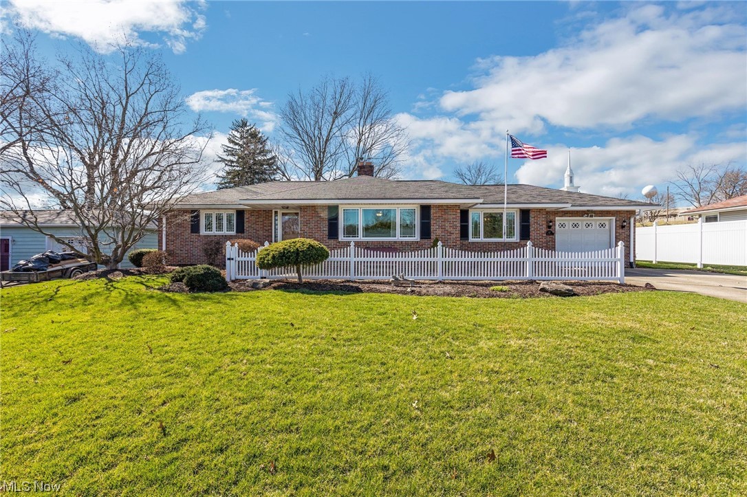 Welcome Home! Come take a look at this beautiful well-cared for 3-bedroom, 2 full bath ranch home nestled on 1/3 of an acre lot. The home features spacious kitchen with lots of cabinetry, black stainless-steel appliances and eat-in space, formal dining room, large living room, updated bathroom, finished lower level and lovely sunroom overlooking a private well-manicured yard. Recent updates include new furnace and A/C in 2022, new premium vinyl planking flooring in kitchen, hall, bathroom, and 1 bedroom currently used as a den, newer carpet in living room, updated shower, new front door, new vinyl fence on side yard and new window treatments and flooring in sunroom. Don't miss out on this hard to find brick ranch!