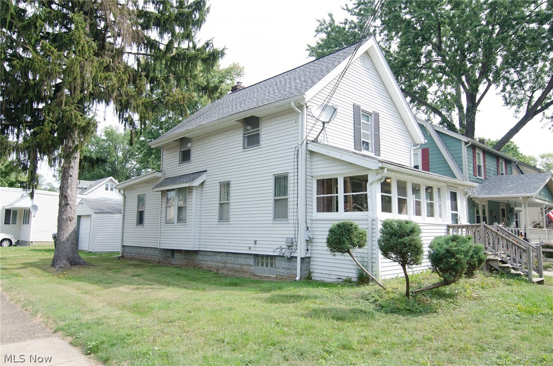 Perfectly located on a corner lot just minutes away from all of Falls' hot spots along the river front! This home has beautifully refinished original hardwood floors in the living room and dining room. There is a wonderful built-in window bench with storage in the dining room too. The nice, clean kitchen comes with the range and refrigerator. The first floor bedroom is at the rear of the home and would also make a perfect office. Upstairs you will find two additional bedrooms and spacious bathroom. A claw foot tub and built-ins give this full bathroom tons of character. In the full basement you will find a washer and dryer that stay, updated electrical boxes, newer furnace, newer hot water tank, shower and great open space for storage. Enjoy the neighborhood from the back porch or enclosed front porch. New A/C unit and furnace in 2002, new roof 2012, hot water tank 2015, garage siding 2015. Take advantage of this amazing price, before it's gone! Call for your private showing today!