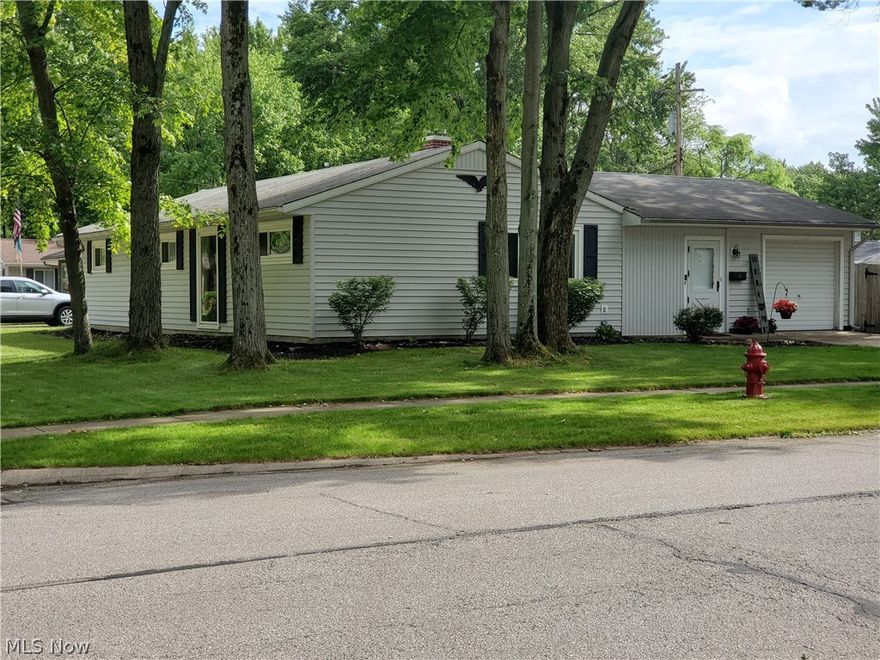 This beautiful ranch style home is located on a wooded lot and is less than a mile away from the Cleveland Metroparks. This Berea house features 3 updated bedrooms, 2 remodeled full bathrooms, a galley style kitchen, spacious living room, enclosed breezeway, fenced in yard, and an attached one car garage with plenty of storage. New carpet throughout the bedrooms, updated flooring throughout the rest of the house. The living room features newly installed windows throughout and the kitchen includes a new dishwasher. Enjoy summer evenings out on the private patio or curl up by the gas fireplace in the living room during the winter snowfalls. Don't miss out on this fantastic home.