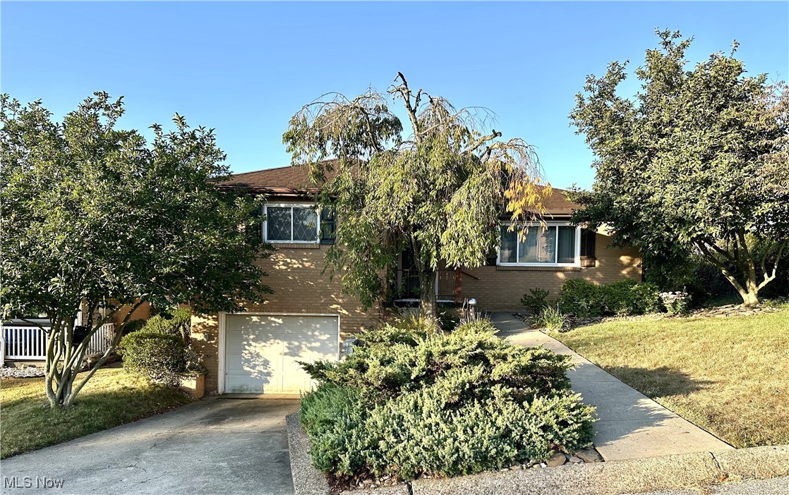 Tucked away on a quiet dead-end street yet close to everyday conveniences, this well-maintained 3-bedroom, 2-bathroom brick ranch offers the best of both comfort and location. The beautifully landscaped front yard adds great curb appeal and welcomes you home. Inside, you’ll find a spacious formal dining room, an eat-in kitchen with updated stainless-steel appliances, and a large living room with expansive windows and direct access to the deck—perfect for relaxing or entertaining. Cozy up by the wood-burning fireplaces in both the living room and the lower-level rec room - just in time for the holidays! This home blends warmth, space, and functionality in a peaceful setting, making it a wonderful place to call home. Don’t miss the chance to make this property yours!