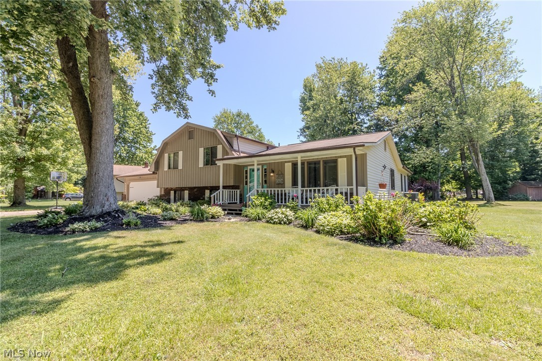 Spacious 4 bedroom split level located in Perry Township! Located in a quiet neighborhood and close to route 20 and route 2. Unwind on the front deck and enjoy the lovely treed and landscaped yard. Relax in the main living room or spend time in the large family room that gets plenty of natural light. Kitchen has stainless steel appliances and snack bar with plenty of room for a sizeable dining table to host family dinners. There are 3 bedrooms up, one of which has a full bathroom, and a 4th bedroom down with another full bath making this a 3 1/2 bathroom house! You will have no issue entertaining in the larger back yard with a paved patio that has plenty of room for an abundance of seating for all your guests! Schedule your showing with me today!!!