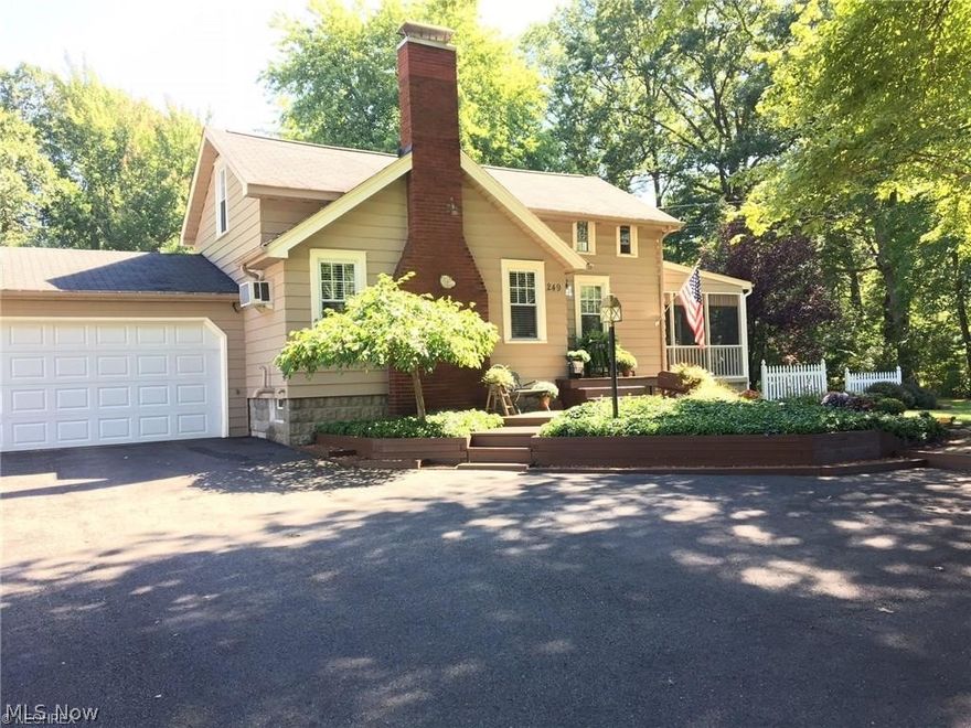 Welcome to this well maintained three bedroom home with two full bathes on 2.5 acres and with lots of character located in beautiful Howland. This home sits far back on a beautiful lot with a large fenced in back yard including wooded area beyond the fence. As you enter, the living room has a stone gas fireplace and original hardwood floors which flow into the formal dining area. Off the dining room is a screened in porch with plenty of room to sit back and relax. The cozy kitchen has been completed renovated with white cabinets and beautiful updates throughout. A large great room, full bath and mud room were added to the back of the home for extra living space. A private deck on the back of the house is a perfect place for outdoor entertaining. Upstairs are three very cute bedrooms with hardwood floors and an updated full bath. A list of updates include, new furnace in 2026 with thermostat, new electrical, new 2021 tankless water heater, windows are 2008 and roof is 1995, 2 additions to the home in 1970 both have baseboard heating, Bluetooth speakers in both bathrooms and much more. If you looking for a home to make your own with plenty of land to build on or create your own paradise within a city limits this is the one for you. Don't hesitate to schedule your showing today!