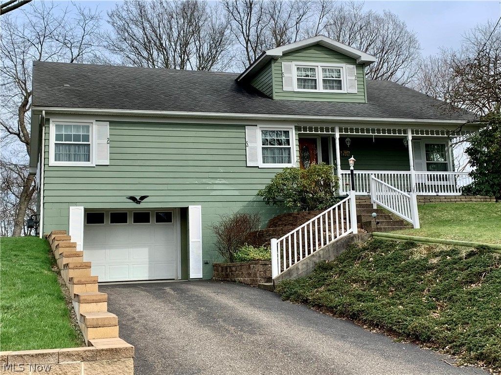 Great location - Hal-Bar Addition! This lovely, Cape Cod style, 1.5 story home has been in the same family for 65 years and lovingly cared for over this time. Enter the foyer to spacious, open living and dining rooms, featuring a floor to ceiling stone fireplace. Hardwood floors are under the living and dining room carpeting. Large picture windows bring in plenty of natural lighting and the scenic view from the rear of the home. There are three, first floor, generously sized bedrooms with beautiful hardwood flooring and the master bedroom offers a half bath and a wall of closets. The first floor offers approximately 1,650 square feet and the half story is an additional 825 square feet of partly finished living space (4th bedroom now) and unfinished storage space which could be completed for an additional bedroom, office or many other uses. A finished family room complete with kitchen, bar and half bath, with yet another wood-burning stone fireplace, is ideal for holiday gatherings. Th