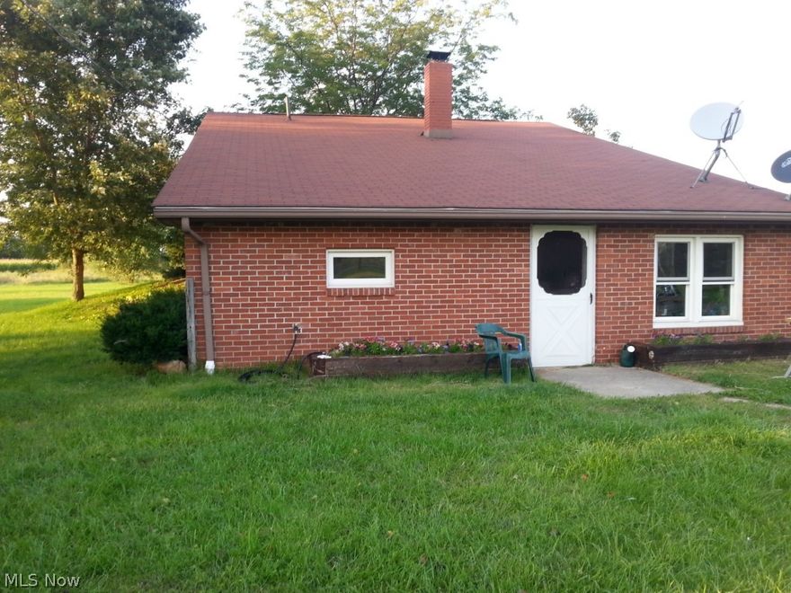 Don't let exterior looks fool you!! Must see inside!! 1578 sqft home on 5 acres!! Quality construction with low utilities in mind. Built with 2x6 and heavily insulated with earth fill on sides for extra insulation. New kitchen counter tops and flooring,new bath, new doors through out along with fresh paint in most rooms.  New washer will be staying.  36x42 barn. Seller relocating $4000 lawn tractor with right offer!!