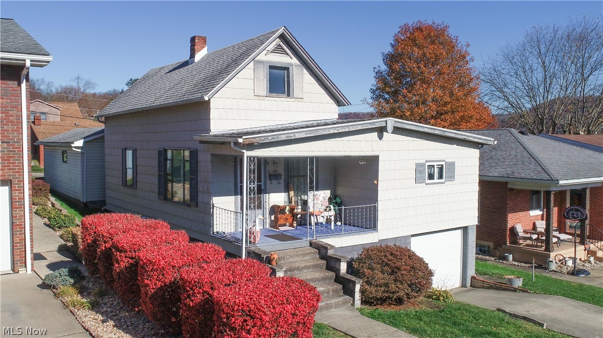 Shadyside - Cozy starter or fixer-up home! This home features generous sized three bedrooms and an eat-in kitchen. The main bedroom is in the rear of the home and is in close proximity to the rear deck. The deck leads to the detached one car garage and the adjacent car port. This property also has an attached garage that is accesible from the full basement. The basement itself is where the laundry room and workshop is located. Plenty of opportunity to bring your ideas to make this home your own and enjoy the local community. The central air conditioning was installed in 2011 and a new roof in 2010.