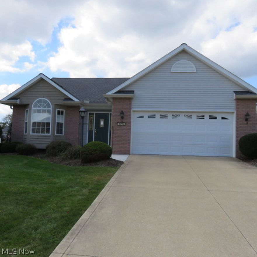 Very nice cluster home with vaulted ceilings in kitchen, dining room and living room.  Upgraded maple cabinets in kitchen and baths.  Finished basement with recreational room, bedroom and bath.  A must see.