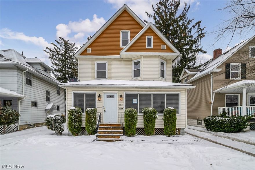 Welcome to Old Meets New.  This beautiful Colonial has been updated while preserving its original charm.  Throughout the home, you will find original hardwood floors, natural woodwork, doors, and built-ins.  You'll also find a brand-new kitchen, new baths, a finished basement, and a new 3rd-floor Primary Suite.  The home has been tastefully and professionally updated and designed.  The stunning custom kitchen features a suite of Cafe appliances and plenty of storage and prep area.  The dining room features a dry bar with a beverage fridge.  The family room has a decorative fireplace and shelving.  You'll find a full bath and laundry room in the lower level of the finished basement.  There is a 1/2 bath on the 1st floor, a full bath on the 2nd floor with 4 bedrooms, and a full bath on the 3rd floor with the Primary Suite.  Warmth, charm, and character abound in this home.  You'll also find a finished front porch, a 2-car garage with new electric doors, a huge parking pad, and a back yard (extends behind the garage).  Please make sure to add this home to your Must See list by contacting your favorite REALTOR®.