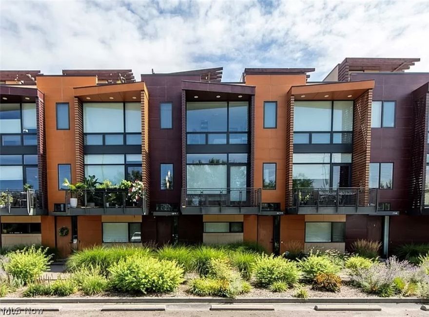 Welcome home to this gorgeous and modern 2 bedroom 3 bath home in charming Little Italy. Boasting a two car garage, a floating staircase encased with a beautiful glass wall that overlooks an open floor plan, a spacious master with a full walk in closet and full bathroom alike, a rooftop and front patio, and so much more. This home has been meticulously cared for and surely will not last. Excellent for students too with The Case Western shuttle stopping directly in front of the unit. Schedule your showing today!