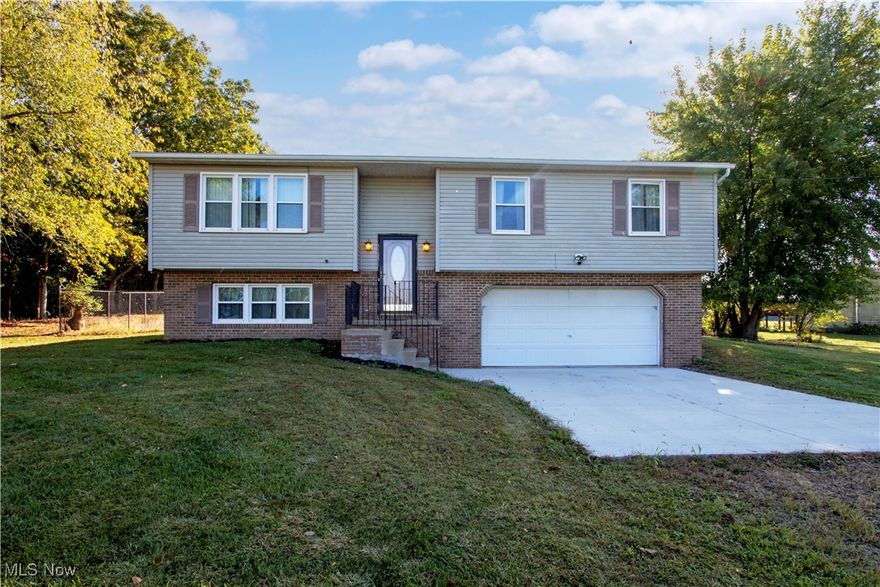 Beautiful views from this 3BR 2 bath home that sits on almost 2 acres. House features living room, dining room, kitchen 3 BR and 2 bath on the 1st level. Family room laundry on lower level. Off the back of the house, you have a fenced in back yard, hot tub and above ground swimming pool. Home has a nice 2 car garage.