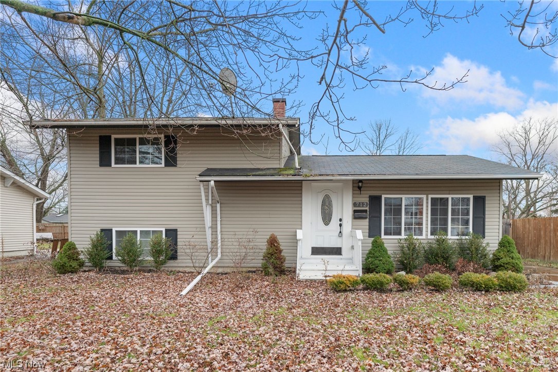 This charming 4 bed, 2 bath split level home is located in a quiet neighborhood, minutes away from Lakewood Beach Park. The property has been well cared for with many updates and upgrades over the years. Enter directly into the open concept main living space and preview this home’s many updates. The living room has exposed wood beams, neutral walls, and LVP flooring that runs throughout the home. The remodeled eat-in kitchen features barstool seating, stainless steel appliances, a window looking out to the backyard, and white marble style backsplash. Both bathrooms have been updated with modern vanities and new showers/tubs. The 4 bedrooms are all carpeted with their own closets. Each set of bedrooms has their own bathroom. The fully fenced in backyard has mature trees, and a shed ideal for storing outdoor tools. Don't miss out, schedule your appointment today!