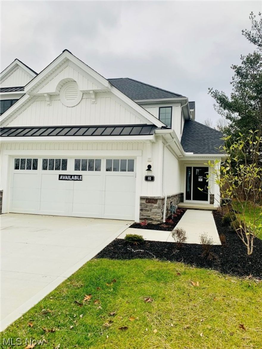 Move-in Ready! Gorgeous END unit Villa w/1st-Flr Primary Suite, full basement ready for late 2023 move-in! Beautiful exteriors feature white vertical siding w/contrasting black trim, black Pella windows & metal roof details. The 2-story foyer welcomes you w/loads of natural light & view of the soaring great room w/window wall & gas fireplace. A rear covered porch right off the great room & the open flow to the spacious kitchen & dining area is perfect for entertaining. Upgraded full-overlay white cabinetry w/crown, black hardware, soft close doors & drawers, & dovetail construction along w/tile backsplash, granite counters, walk-in pantry & GE ss appliances make for a beautiful + functional kitchen. There is a convenient 1st flr laundry w/utility sink & a spacious powder rm off back hall. The main flr Owner’s suite features a walk-in closet & priv bath w/tile shower & dual quartz vanities w/undermount sinks. Upstairs, you’ll find 2 addtl bedrms each w/walk-in closets, full bath, & an open loft. The full basement is roughed in for a future full bath. Addtl upgrades: black matte door hardware & plumbing fixtures, LVP flooring, & elongated comfort height bathroom fixtures. Snow removal & landscaping handled by HOA. 85%, 15 Yr Property Tax Abatement provides MAJOR savings w/property taxes averaging around $100/mo! Contact city for details. Final opportunities in this prime location– none of the hassles w/surrounding new construction!
