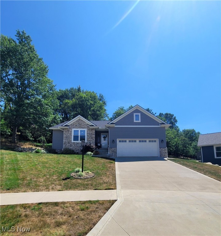 This stunning ranch home, built in 2020, offers the perfect blend of modern design, functionality, and comfort. Situated on a 0.25-acre lot, this 1,652 sq. ft. property features an inviting open-concept layout filled with natural light and high-quality finishes.
Step inside to a bright and spacious living area that flows seamlessly into the kitchen and dining space—complete with stainless steel appliances and a sleek, modern design. The owner’s suite is thoughtfully positioned on one side of the home and includes a walk-in closet and bathroom with a double vanity. On the opposite side, two additional bedrooms share a convenient Jack-and-Jill style bathroom, offering privacy and comfort for family or guests. Additional highlights include: Mudroom with laundry off the garage entrance. Fully finishable basement for future added living space. Outdoor stone retaining wall and concrete patio—perfect for entertaining or relaxing. Recent updates: Water heater (May 2025) & water softener (Dec 2023). Regularly maintained furnace & AC. A one-year home warranty included for peace of mind. This home offers a rare opportunity to own a move-in ready, modern ranch with thoughtful details and room to grow. Schedule your private showing today before its too late.