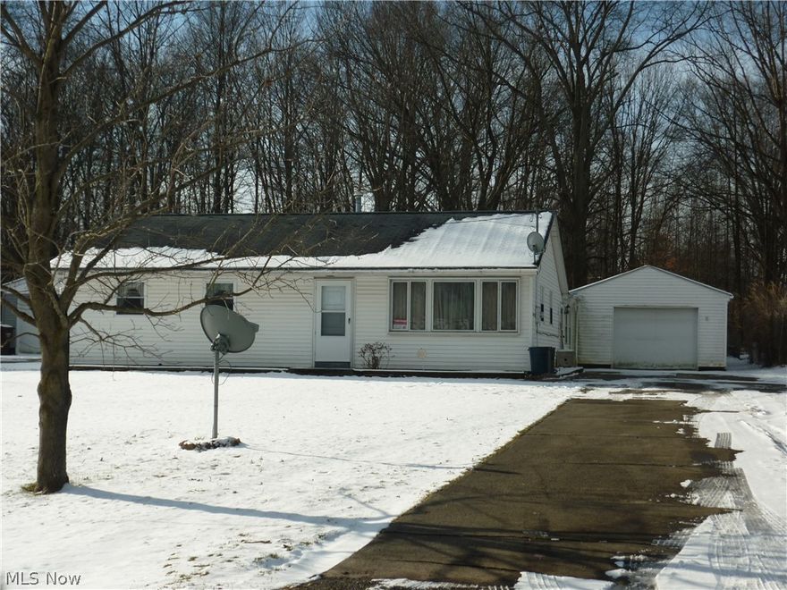 Lots of updates including newer windows, kitchen cabinets, and vinyl siding with this fabulous ranch home. Extra "storage" in the garage (garage is doubly deep). Just waiting for your finishing touches to this desirable home in the Champion School District.