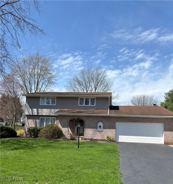 Beautifully maintained and updated 4/5 bedroom home in Reindeer Heights. This home has great finished space with a first floor in-law suite with a first floor full bath. The in-law suite has a wall of large storage closets and and adjacent kitchenette. Both these renovations were professionally done to be able to revert back to the original living room and dining room if so desired. Additionally the beautiful eat-in kitchen was remodeled with custom Amish crafted natural cherry cabinets, luxury vinyl flooring, recessed and overhead specialty lighting, under cabinet lighting and moveable island. The large family/living room features a beautiful brick wood burning fireplace. The upstairs features a large Master suite with ensuite updated master bath featuring a step-in shower, tile floor and vanity with Corian countertop. three additional bedrooms have updated flooring and lighting each with lighted ceiling fans and large closets. The upstairs main bath has been updated with a jetted soaker tub, tile floor and vanity with Corian countertop. The lower level offers about 450 sq ft additonal finsihed spaces with two rooms that just need a little updating to make them your own space. Home has newer siding gutters and downspouts, windows were freshly painted to match new siding.